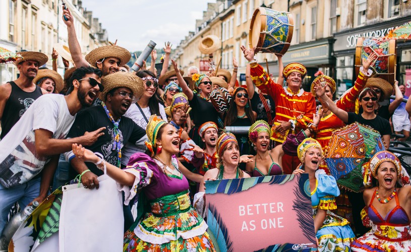 Crowd of people in costume at Bath Carnival